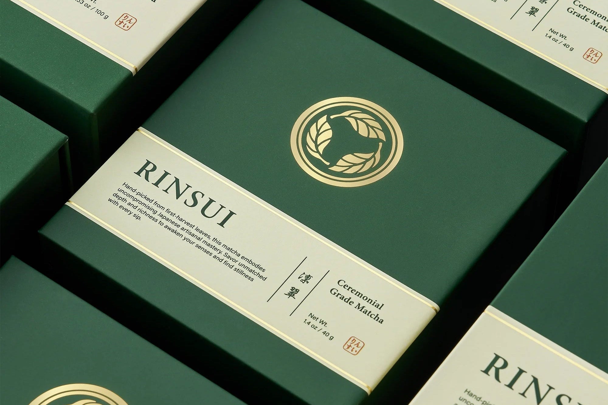 Dark green Rinsui Ceremonial Grade Matcha boxes with cream labels and gold circular logos, arranged in a clean grid pattern.